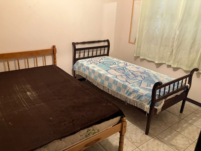 Sobrado Amarelo pé na areia 